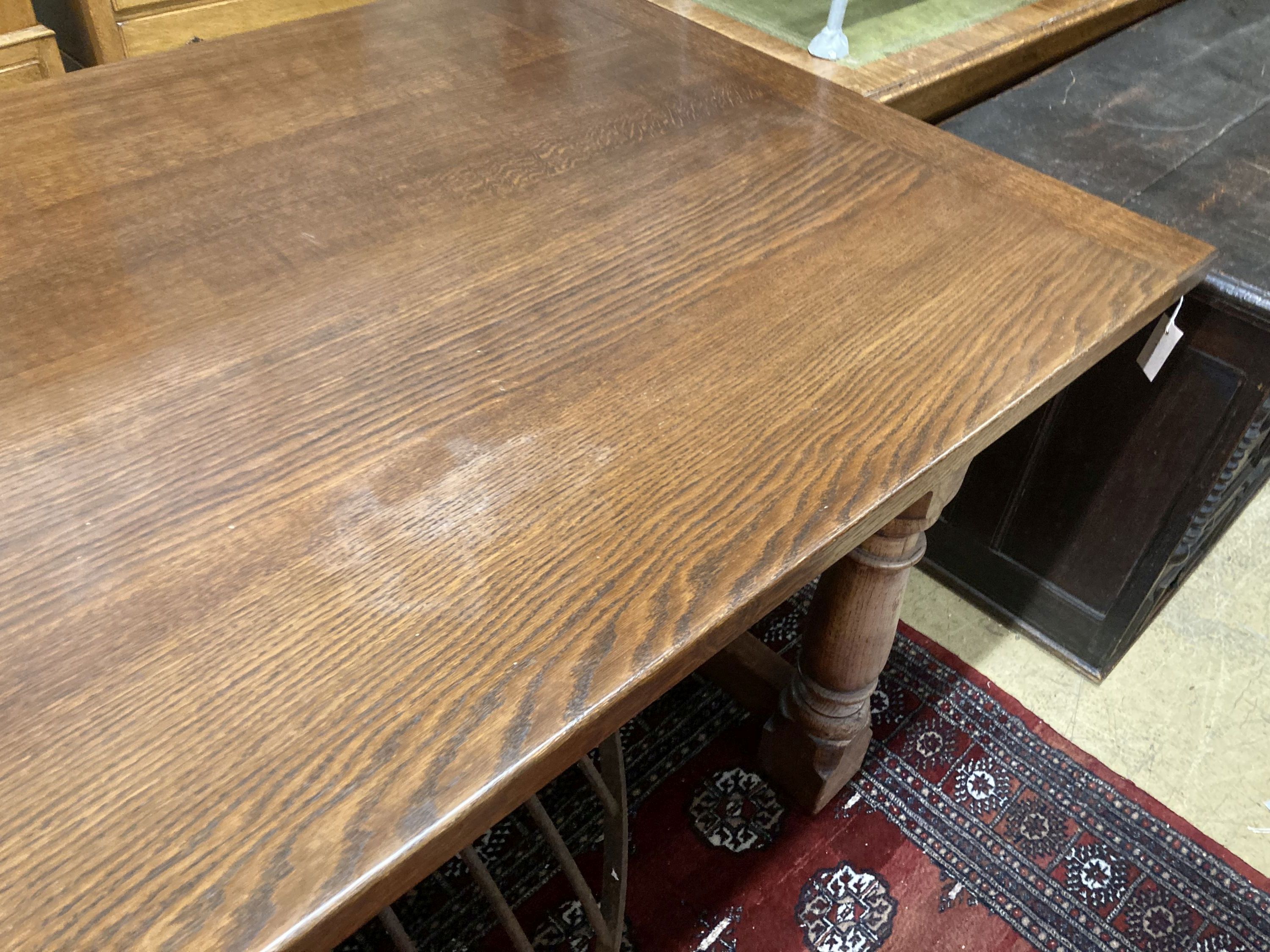 An 18th century style oak rectangular refectory dining table, length 277cm, width 109cm, height 76cm